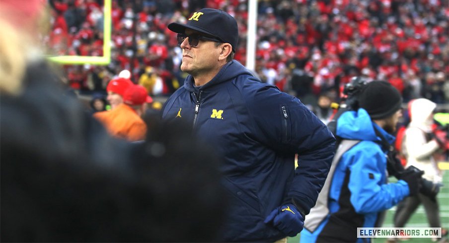 Disappointed Michigan Head Coach Jim Harbaugh