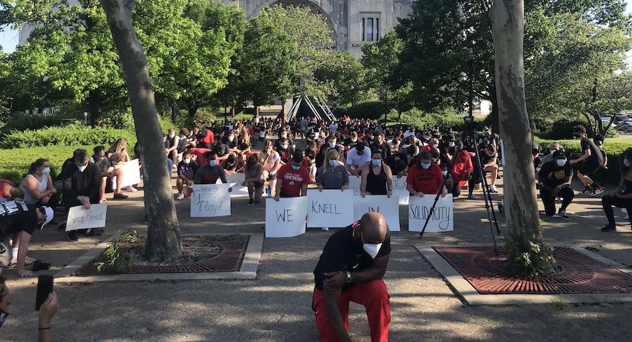 Ohio State athletes and staff participate in the Kneel for Nine.