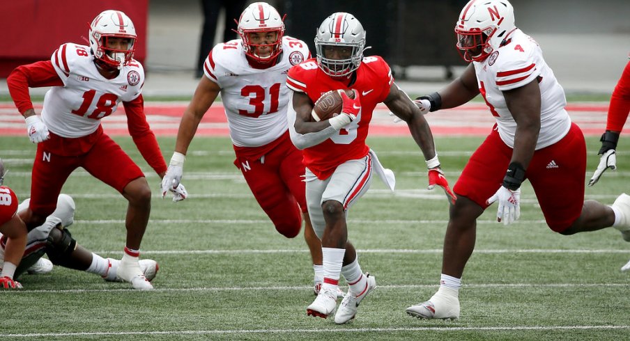 Trey Sermon eludes multiple Nebraska defenders on his way to a big run.