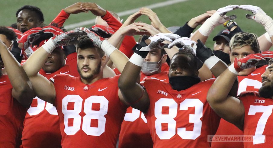 Ohio State players during Carmen postgame