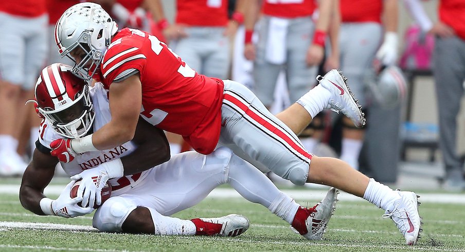 Tuf Borland tackles Stevie Scott in the 2018 Ohio State-Indiana game