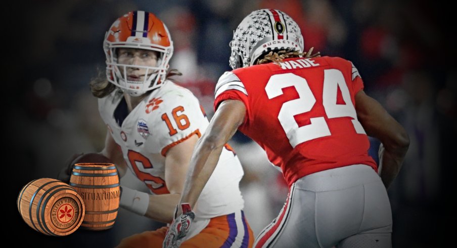 Dec 28, 2019; Glendale, AZ, USA; Ohio State Buckeyes cornerback Shaun Wade (24) tackles Clemson Tigers quarterback Trevor Lawrence (24) in the 2019 Fiesta Bowl college football playoff semifinal game at State Farm Stadium. Wade would be ejected from the game for targeting. Mandatory Credit: Mark J. Rebilas-USA TODAY Sports