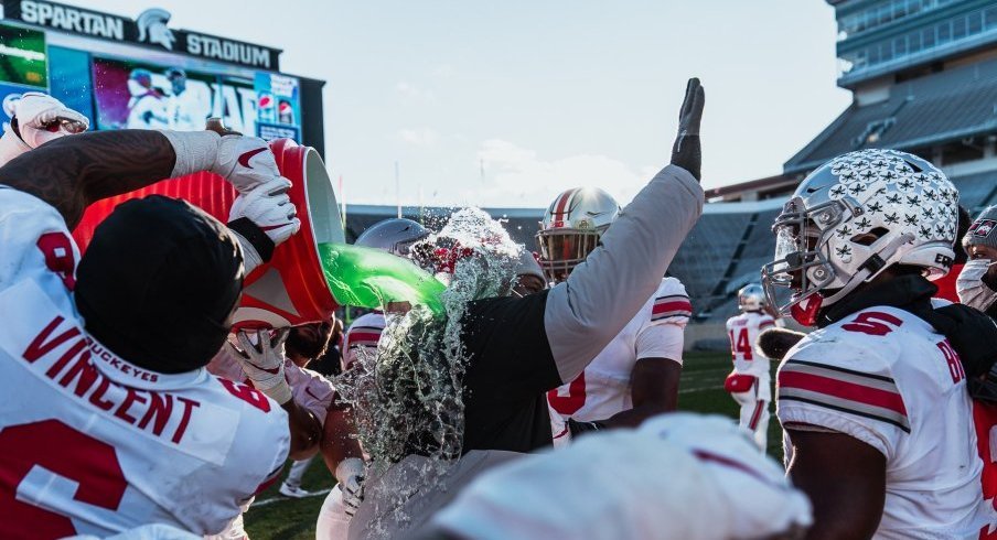 Larry Johnson enjoys a Gatorade bath. 