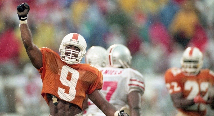 On a day of big plays by Tennessee, Vols defensive back Tori Noel (9) celebrates after recovering an Ohio State fumble in the Citrus Bowl game in Orlando, Fla., Jan. 1, 1996. With both teams tied in the rankings at No. 4 going into the game, Tennessee came out on top 20-14.
