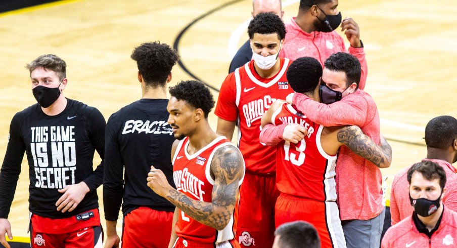 Ohio State men's basketball celebrates after a big win on the road against Iowa