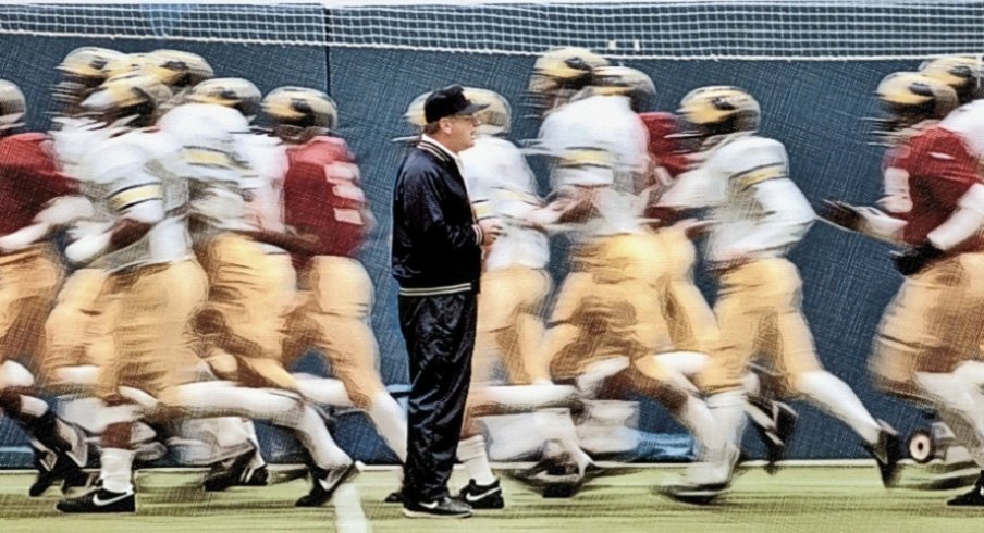 Bo Schembechler with his players during practice in October 1986 before the game that he won his 200th career victory. They are at the University of Michigan practice facility in Ann Arbor. Mary Schroeder Photos 28