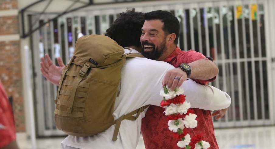 J.T. Tuimoloau and Ryan Day