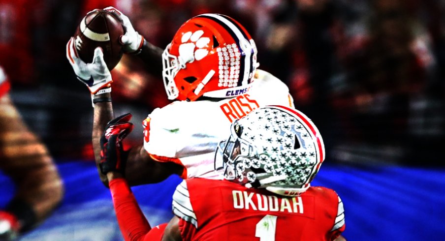 Dec 28, 2019; Glendale, Arizona, USA; Ohio State Buckeyes cornerback Jeff Okudah (1) breaks up a pass against Clemson Tigers Justyn Ross (8) in the third quarter in the 2019 Fiesta Bowl college football playoff semifinal game. The play was reviewed and not ruled a fumble. Mandatory Credit: Matthew Emmons-USA TODAY Sports