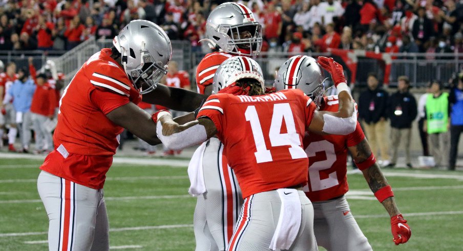 Ohio State's Ronnie Hickman celebrates with his teammates