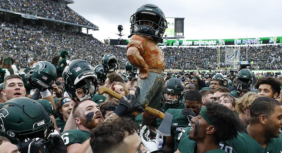 Michigan State claims the Paul Bunyan Trophy