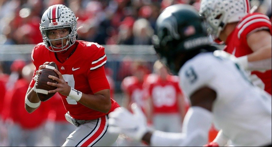 C.J. Stroud prepares to fire a strike against Michigan State. 