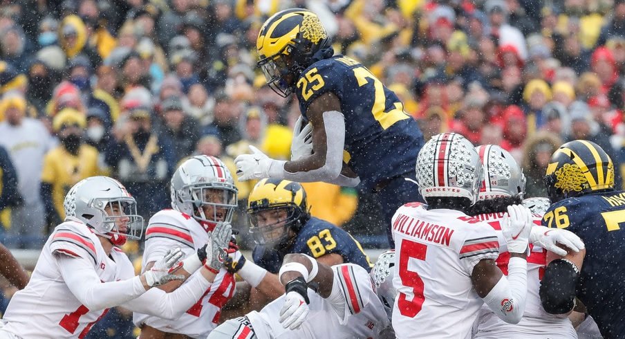 Michigan running back Hassan Haskins scores