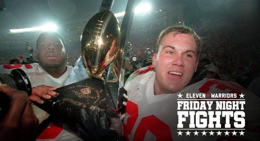 After winning the 1997 Rose Bowl OSU #65 Juan Porter and Greg Bellisari share passing around the Rose Bowl Trophy . Photo by Eric Albrecht 