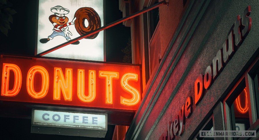 The neon sign of Buckeye Donuts burns bright.