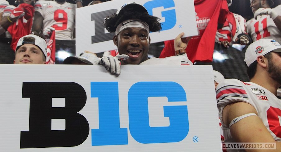 Javontae Jean-Baptiste with Big Ten sign