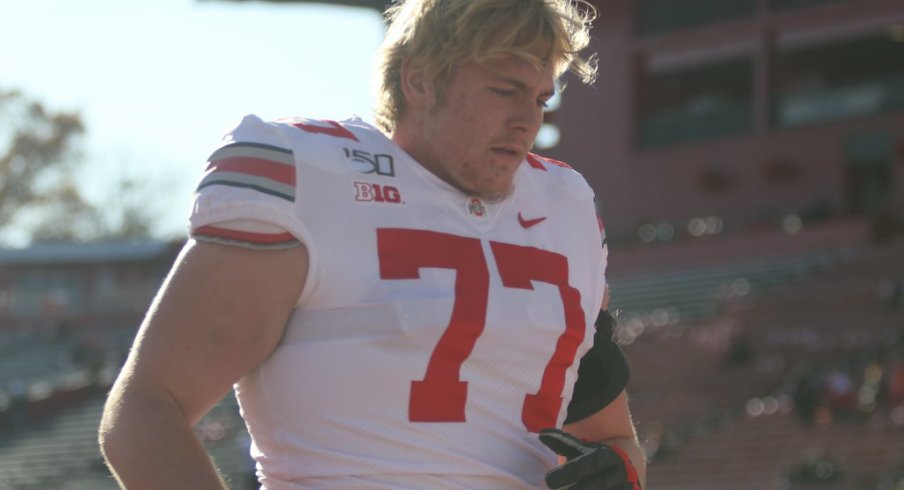 Harry Miller walks off the field.