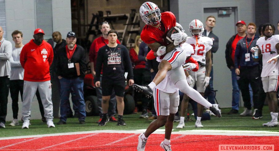 Jaxon Smith-Njigba makes a catch in practice