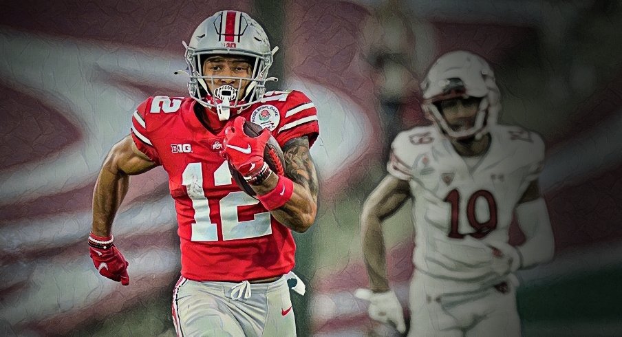 Ohio State Buckeyes wide receiver Emeka Egbuka (12) returns a kickoff ahead of Utah Utes wide receiver Bryson Reeves (19) during the third quarter of the Rose Bowl in Pasadena, Calif. on Jan. 1, 2022. College Football Rose Bowl