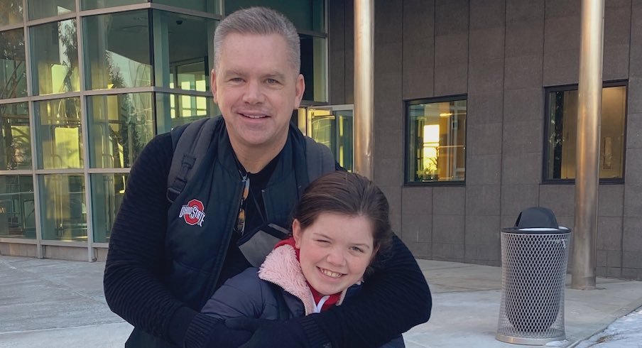 Chris Holtmann and his daughter