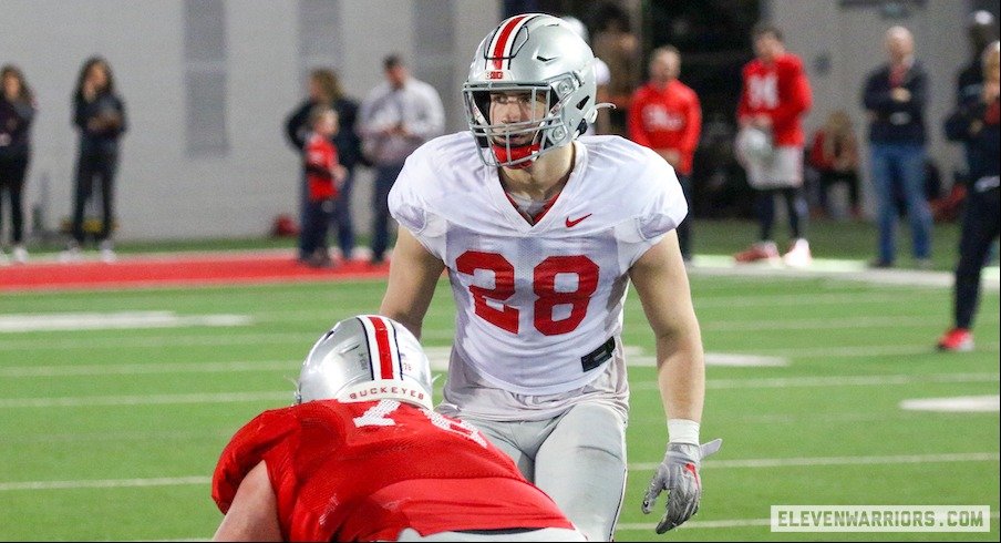 Reid Carrico lines up for a play in practice.