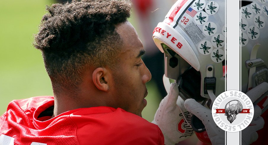 TreVeyon Henderson is putting on his helmet in today's skull session.