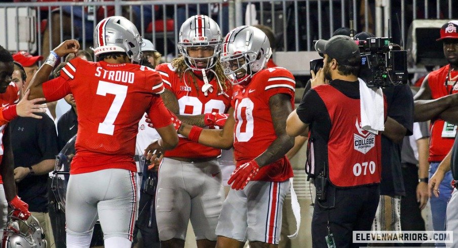 C.J. Stroud celebrates with Xavier Johnson.