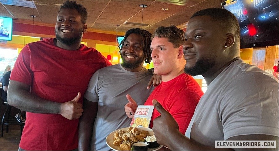 Dawand Jones, Donovan Jackson, Luke Wypler and Matt Jones at Applebee’s