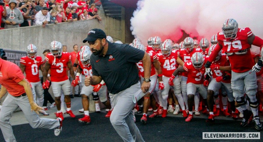 Ryan Day runs out with his team