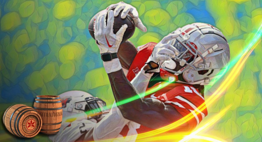 Sep 10, 2022; Columbus, Ohio, USA; Ohio State Buckeyes wide receiver Marvin Harrison Jr. (18) makes the touchdown catch over Arkansas State Red Wolves cornerback Leon Jones (2) during the second half at Ohio Stadium. Mandatory Credit: Joseph Maiorana-USA TODAY Sports