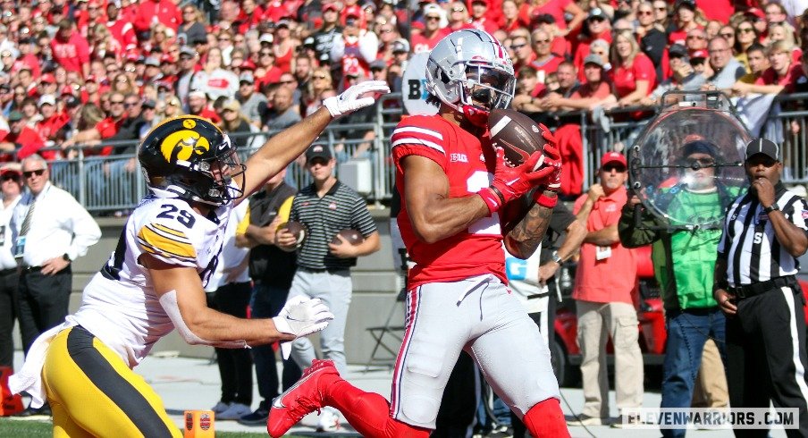 Ohio State's Emeka Egbuka hauls in a touchdown against Iowa