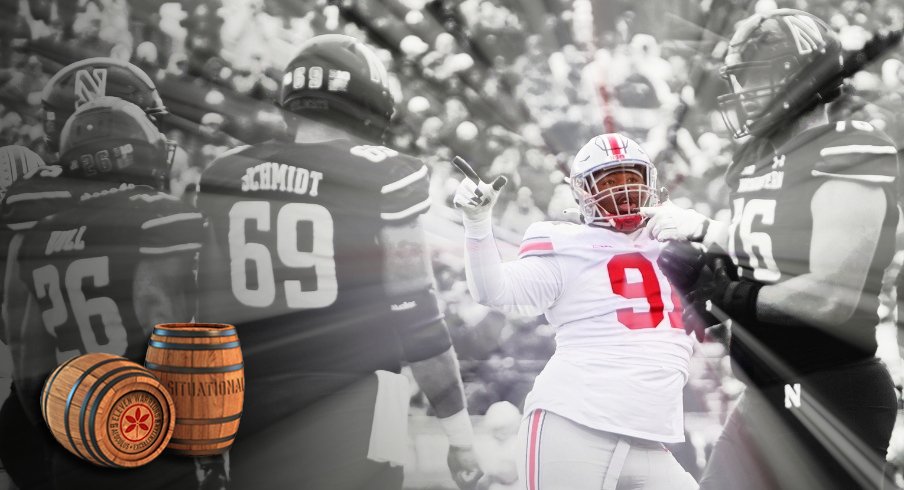 Nov 5, 2022; Evanston, Illinois, USA; Ohio State Buckeyes defensive tackle Tyleik Williams (91) signals a penalty on the Northwestern Wildcats offense during the second half of the NCAA football game at Ryan Field. Ohio State won 21-7. Mandatory Credit: Adam Cairns-The Columbus Dispatch Ncaa Football Ohio State Buckeyes At Northwestern Wildcats