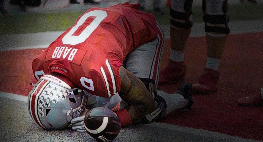 Ohio State Buckeyes wide receiver Kamryn Babb celebrates his touchdown in the fourth quarter of their NCAA Division I football game between the Ohio State Buckeyes and the Indiana Hoosiers at Ohio Stadium.