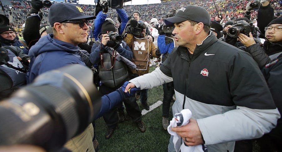 Jim Harbaugh and Ryan Day after Michigan’s win over Ohio State in 2021.