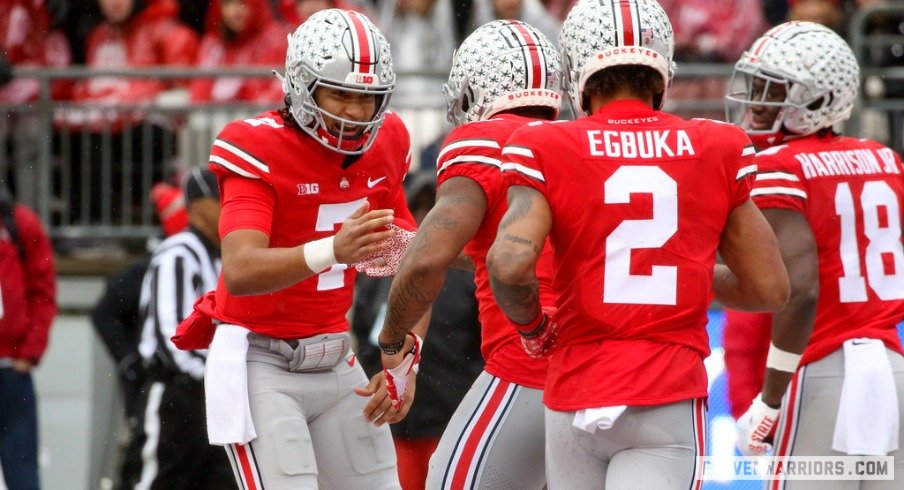 C.J. Stroud, Miyan Williams, Emeka Egbuka and Marvin Harrison Jr. celebrate a touchdown.