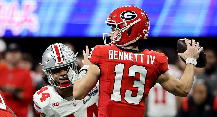 Georgia quarterback Stetson Bennett IV attempts a pass in the Peach Bowl