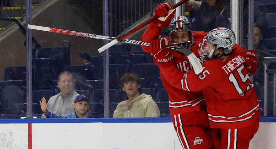 The Buckeyes celebrate after one of their eight goals vs. Harvard.