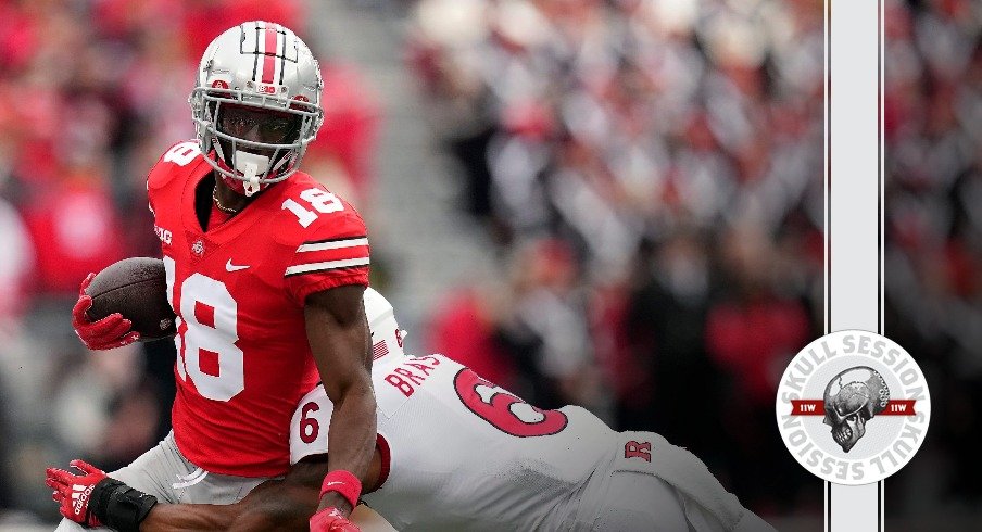 Ohio State Buckeyes receiver Marvin Harrison Jr. wears Louis