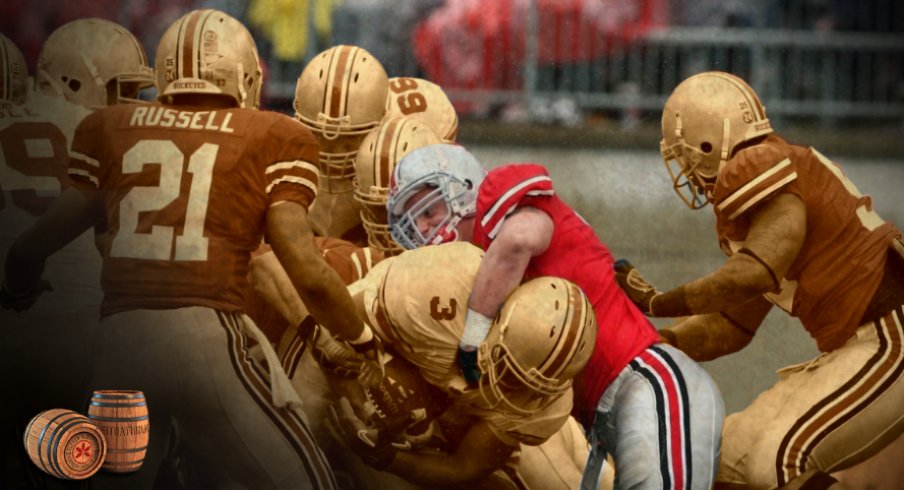 Apr 19, 2007; Columbus, OH, USA; Ohio State Buckeyes running back Brandon Saine (3) gets tackled by Ohio State Buckeyes linebacker James Laurinaitis (33) for the 2008 Spring Game at Ohio Stadium. 