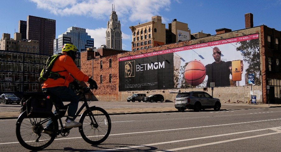 Downtown Columbus with a sportsbook ad on the side of a building