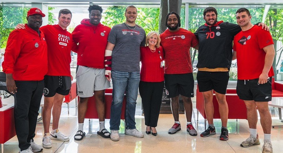 Ohio State football players at hospital.