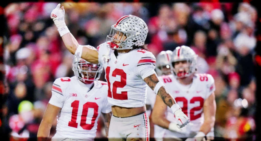 Nov 19, 2022; College Park, MD, USA; Ohio State Buckeyes safety Lathan Ransom (12) celebrates after blocking a Maryland Terrapins punt in the third quarter in their Big Ten game at SECU Stadium