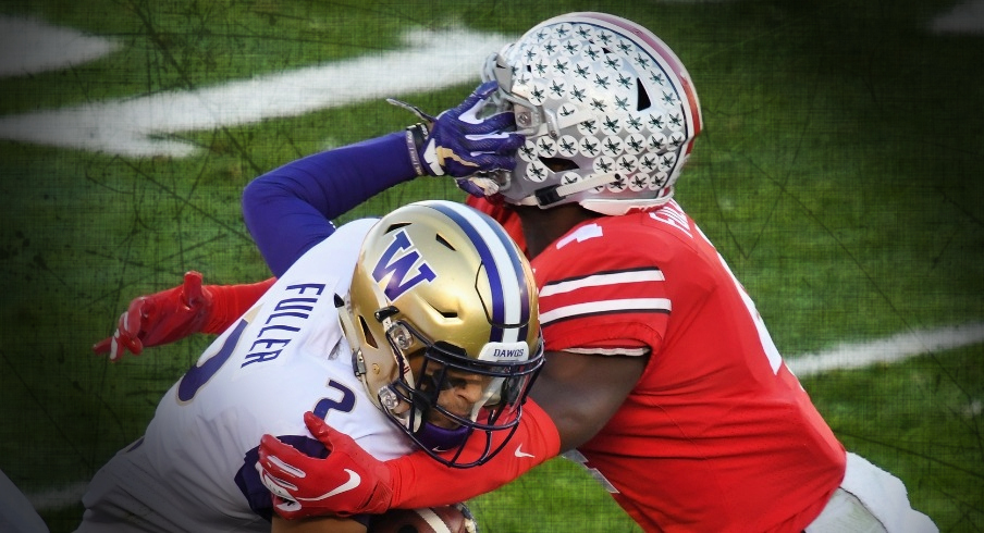 Jan 1, 2019; Pasadena, CA, USA; Washington Huskies wide receiver Aaron Fuller (2) runs against Ohio State Buckeyes safety Jordan Fuller (4) in the first half in the 2019 Rose Bowl at Rose Bowl Stadium. Mandatory Credit: Robert Hanashiro-USA TODAY Sports