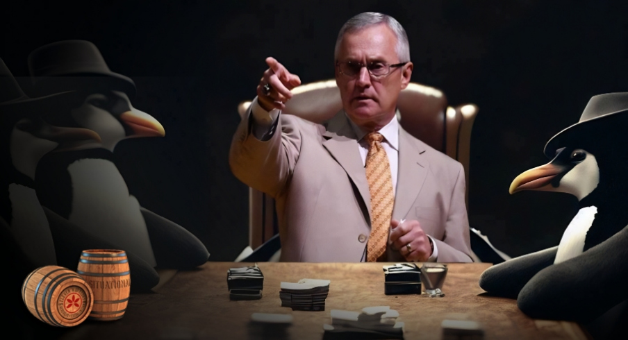 jim tressel surrounded by penguin capos