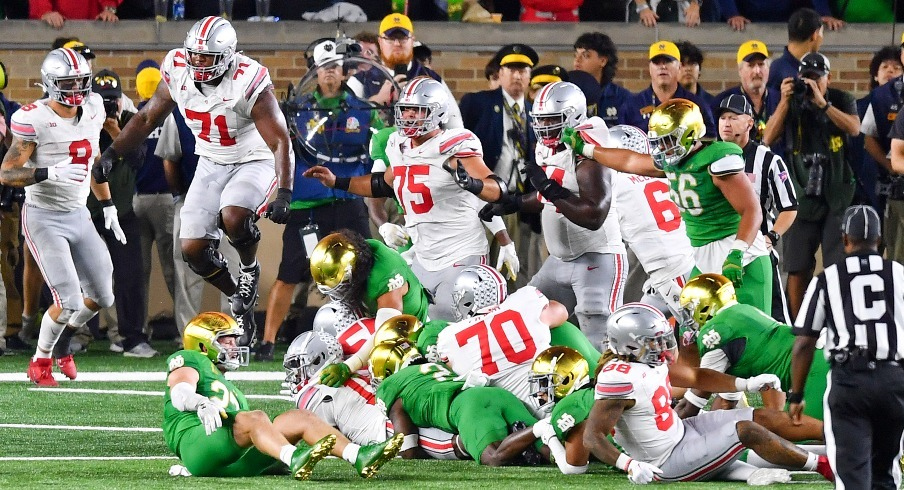 Ohio State celebrating following Chip Trayanum's game-winning touchdown.