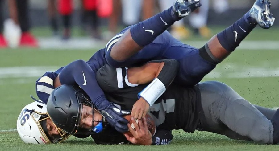 Bishop Sycamore quarterback getting tackled