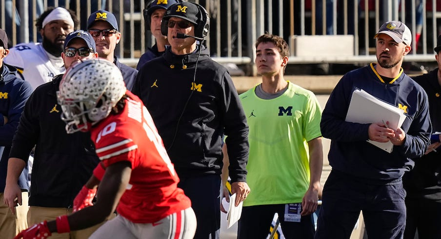 Jim Harbaugh and Connor Stalions