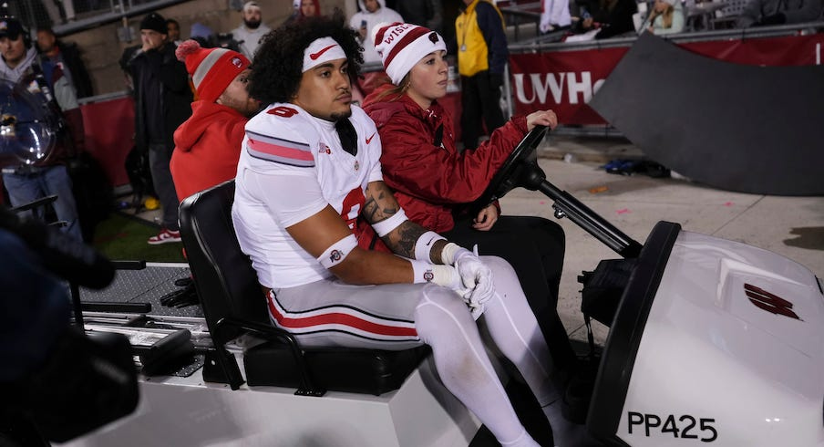 Lathan Ransom being carted back to the locker room