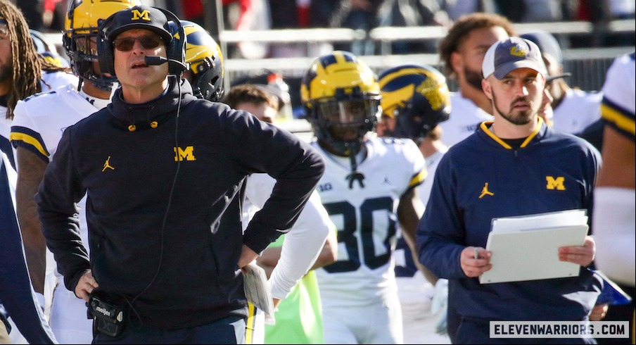 Jim Harbaugh and Connor Stalions during the 2022 Ohio State/Michigan game