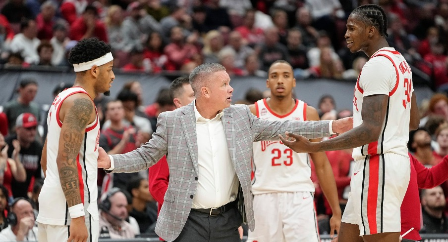 Roddy Gayle Jr., Chris Holtmann and Felix Okpara