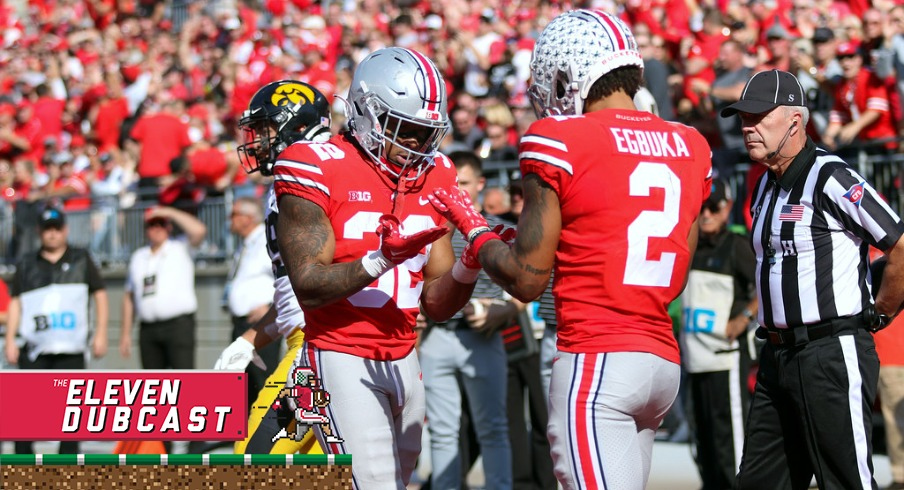 Ohio State football players TreVeyon Henderson (left) and Emeka Egbuka (right)